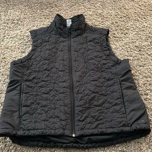 Black vest 
Fits like a M